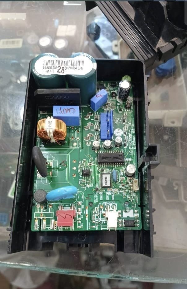 A motor control board out of its housing, on our bench for testing.